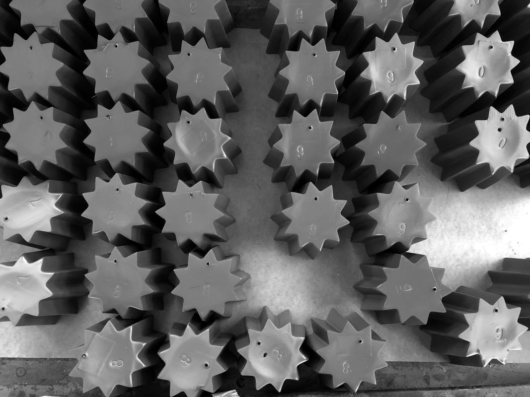 Star-shaped shoe details laid out in rows