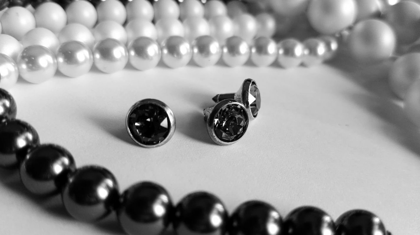 Pearls and jewelled buttons for shoe decorations