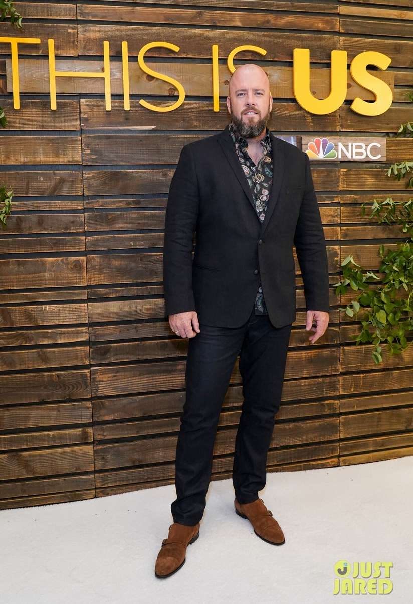 Guest in a black blazer and tan suede monk-strap shoes